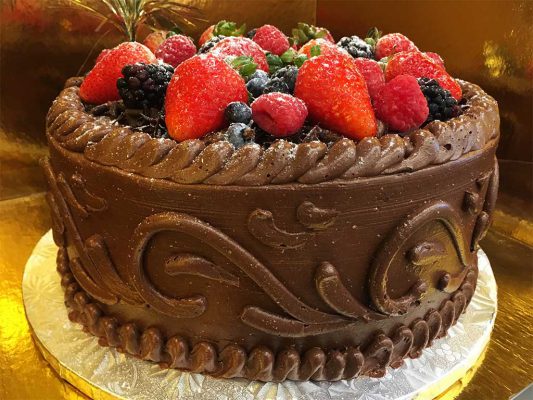 chocolate buttercream cake with gerards signature wedding cake design - dessertsbygerard.com